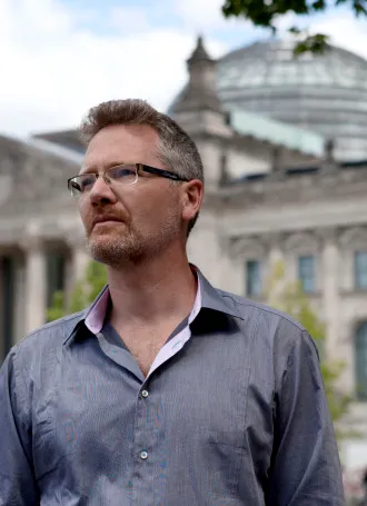 Adam Tooze looking off into the distance.